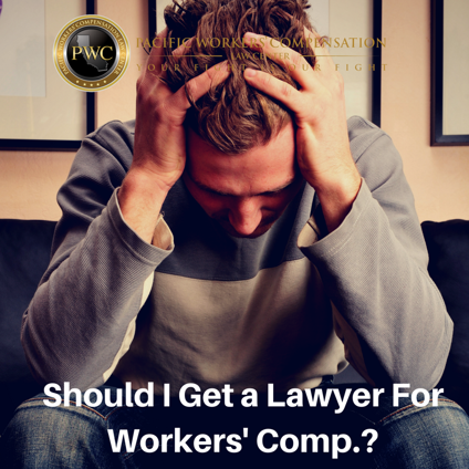 Should you get a lawyer for Workers' Comp? Image, injured worker with head in hands. 