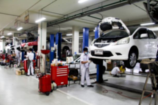 Workers in an Auto Shop