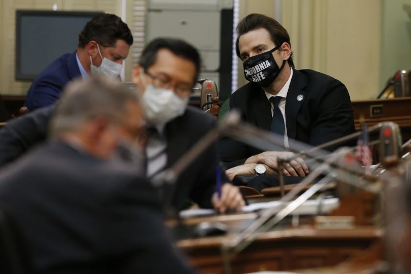 California Lawmakers with masks in a meeting