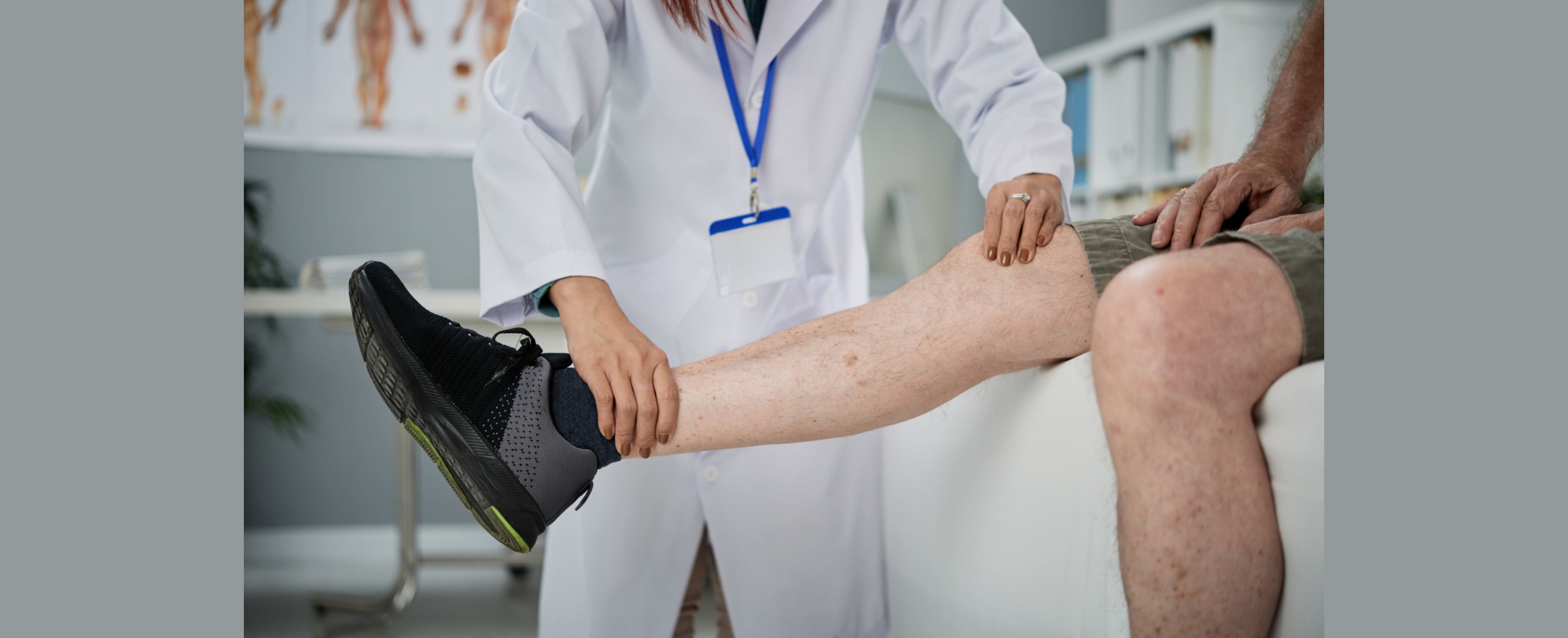 Man at doctor for workers comp settlement for knee injury