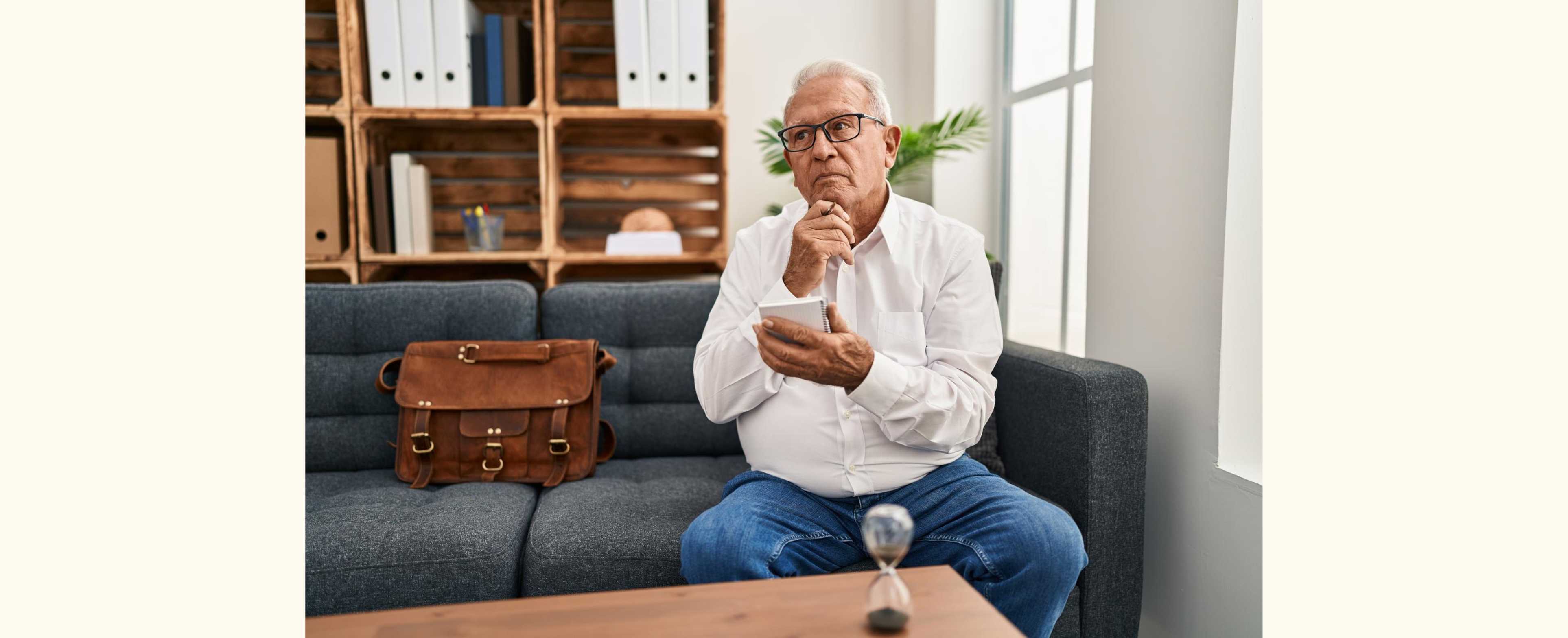 Worker at home thinking should I hire a workers' comp attorney?