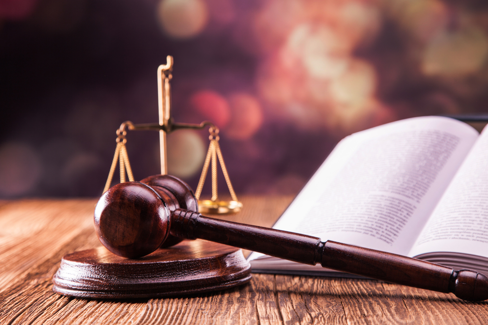 Law code, gavel and books.