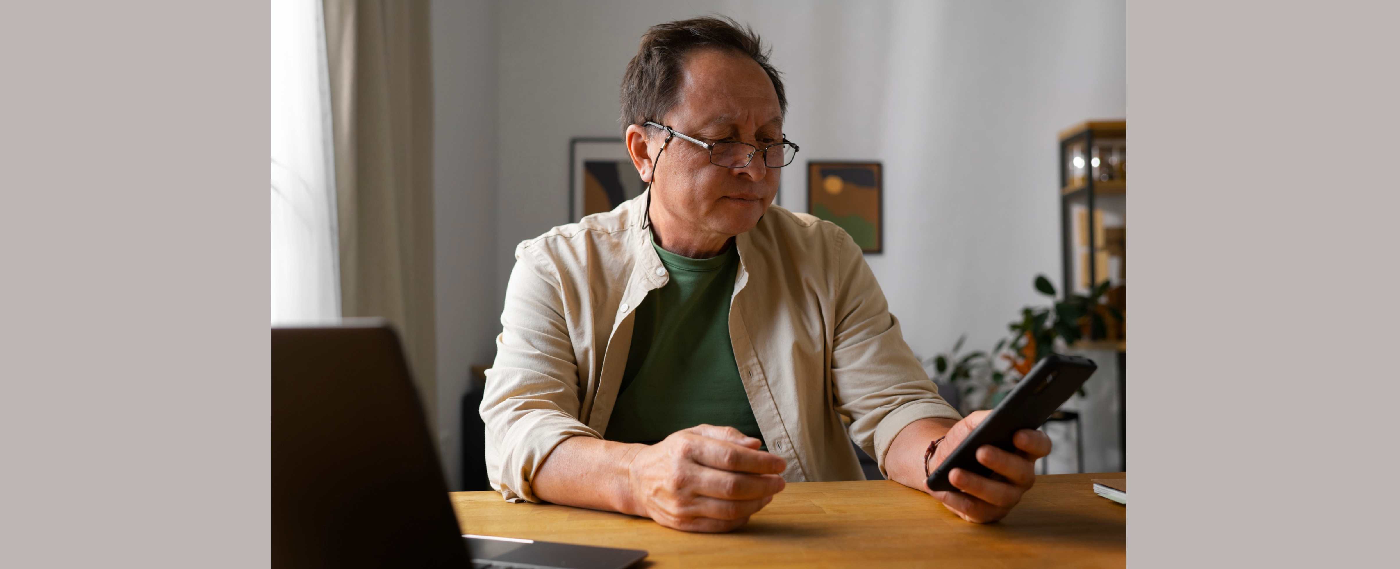 Man reading apout California Workers’ Comp Payment Changes for 2026